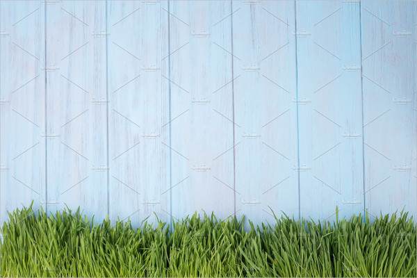Green Grass Over Wood Background