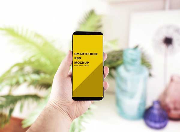 Free Hand Holding Smartphone Mockup