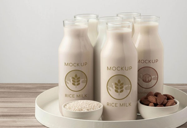 Free Milk Bottle Concept Mockup PSD